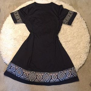 Black dress with metallic tribal design dress